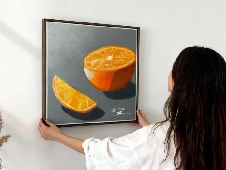 Woman hanging fruit art print.
